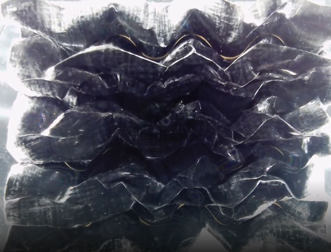 experimental crushing of curved crease miura-ori folds