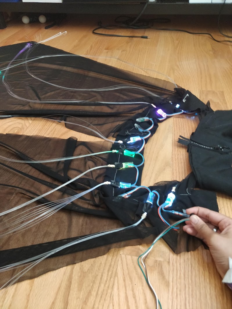an led+fiber optic-based senior ball dress